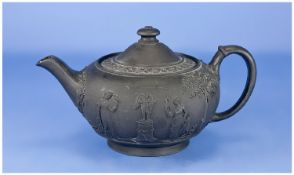 Wedgwood Black Basalt Teapot with classical decoration to body, 6 inches in height.