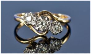 18ct Gold Set Three Stone Diamond Twist Ring, illusion set. Fully hallmarked. Circa 1970`s.