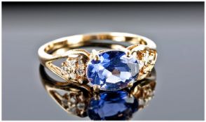 Ladies 9ct Gold Sapphire and Diamond Ring. Fully hallmarked. The central sapphire flanked to each