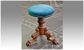 Victorian Carved Oak Piano (Revolving) Music Stool. On three carved paw feet, with turned centre