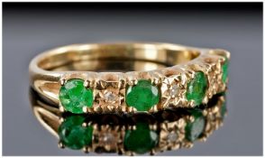 9ct Gold Set Emerald & Diamond Ring, 4 emeralds with diamond spacers. Fully hallmarked.