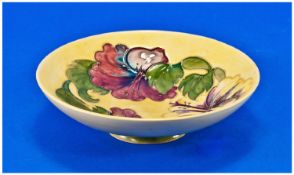 William Moorcroft Signed Footed Bowl `Hibiscus` Various, on yellow ground. Impressed marks to