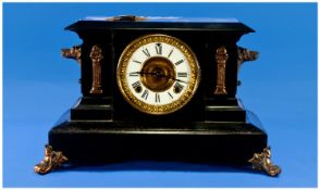 Ansonia New York Black Marble Mantel Clock. 8 day striking movement, porcelain dial. 10.75 inches