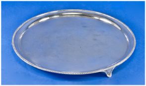 Elkington & Co Circular Silver Drinks Tray, with beaded border. Raised on four splayed feet.