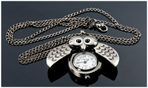 Owl Shaped Pendant Watch on chain, the owl shown as a cute standing figure in a brushed silvery