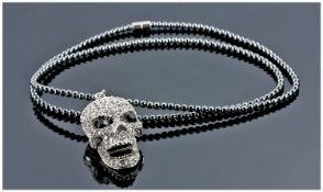 Butler & Wilson Style Crystal Skull Pendant on Hematite Chain, the skull, with articulated, opening