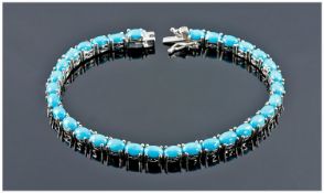 Silver Tennis Bracelet Set With Polished Cabochon Turquoise Coloured Stones, Length 8 Inches, Fully