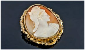 Victorian Large Shell Cameo Brooch set in a gold coloured open worked frame. 2.5 inches high.