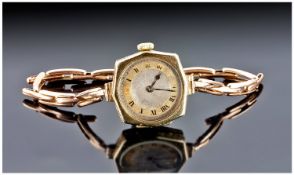 Ladies 1920`s 9ct Gold Cased Six Sided Wrist Watch fitted on a 9ct gold expanding bracelet. Fully