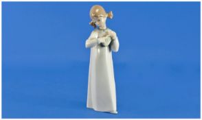 Lladro Figure ``Girl with Guitar``, model number 4871. Issued 1974. Height 7.75 inches.