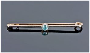 15ct Gold And Platinum Set Single Stone Blue Zircon Bar Brooch. Circa 1930`s. Excellent quality.