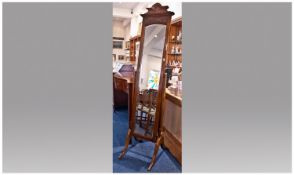 Edwardian Mahogany Cheval Mirror, with carved top. The bevelled plate between two plain uprights on