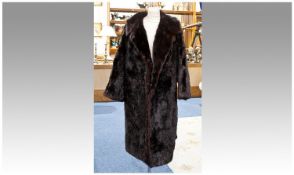 Dark Red Brown Full Length Fur Coat, probably skunk, self lined collar with revers, slit pockets,