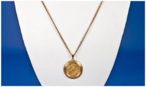 A 22ct Gold Victorian Young Head Full Sovereign, date 1884. Set in a 9ct gold pendant and fitted on