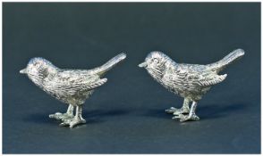 A 20th Century Pair of Silver Plated Small Bird Figures. Each 2 inches high.