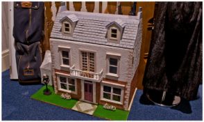 Musician Style Dolls House Comprising Of 2 Floors And Attic. First floor living room and kitchen,