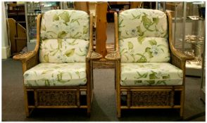 A Good Pair of Bamboo/Cane Framed and Upholstered Conservatory Arm Chairs. With removable seats and