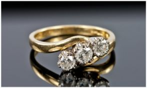 18ct Gold Diamond Ring, Set With Three Round Cut Diamonds On A Twist, Estimated Diamond Weight .