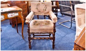 An Oak 17th Century Armchair. The seat, back and arms upholstered and hand stitched with silk and