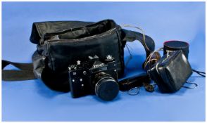 Zenit Camera with various equipment together in canvas carrying case including lenses etc.