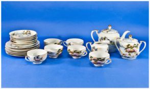 Oriental Teaset 1930`s Japanese Porcelain. Includes teapot, sugar and cream, 6 teacups, 6 side