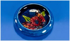 Moorcroft Inverted Small Bowl `Orchids` Design on blue ground. 4.5`` in diameter. Excellent