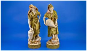 Royal Dux Bohemia Very Fine Pair of Water Carrier Figures. Mould number 1050 and 1051, c.1897-1905.