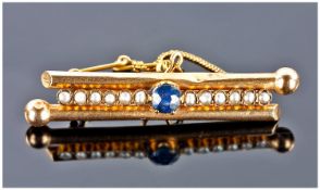 Russian 19th Century 12ct Gold Channel Set Sapphire and Seed Pearl Brooch with safety chain.