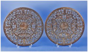 Pair of Coalbrookdale Iron Fruit Plates, decorated with mythical god figures with a sunburst