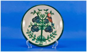 Walter Moorcroft Modern Cabinet Plate `Birds And Plums` Design, cream ground, green border. 10.25