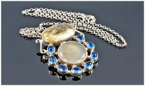 Art Form Silver Set Pendant Set with blue & clear stones fitted on a silver chain. Stamped 925.