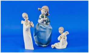 Nao Figures by Lladro, 3 in total. Tallest figure 8 inches high. All pieces are in mint condition.