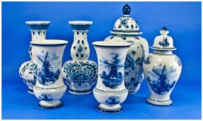 Two Sets Of Delft Vase Garnitures, All Hand Painted, Two Vases With Covers. Typical Blues With