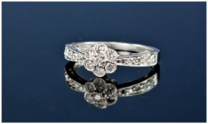 9ct White Gold And Diamond Cluster Ring, Flower Head Design With Diamond Shoulders. Diamonds of