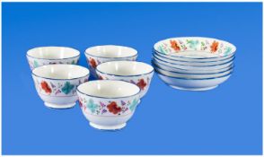 Set Of 5 New Hall Type Porcelain Tea Bowls And Saucers, with one extra saucer. 11 pieces in total.