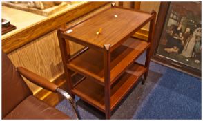 Teak Three Tier Tea Trolley Of Oblong Form. Height 26 inches, width 24 inches, depth 14 inches.