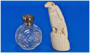 Small Victorian Silver Topper Cut Glass Perfume Bottle together with ivory bird figure.