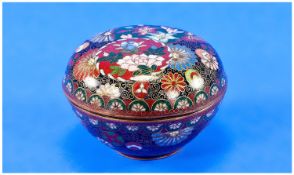 A Japanese Enamel Cloisonee Lidded Round Trinket Box, of good quality. Decorated with flowers