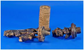 Three African Wood Artifacts. Two small carved wooden figure plus one bamboo etched vase.