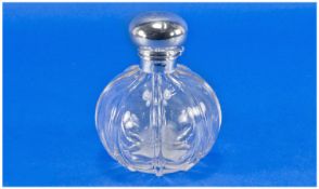 A Silver Hinged Topper & Collared Melon Shaped Glass Perfume Bottle, complete with inner stopper.