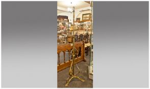 Art Nouveau Brass Telescope Standard Lamp, in the manner of W.A.S. Benson. Supported on three