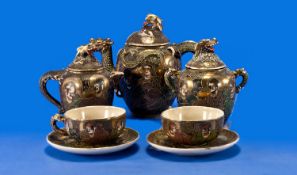 Satsuma Early 20th Century Tea Set For Two. Comprises 1 tea pot, 2 cups and saucers, lidded sugar