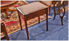 Mahogany Piano Stool, with lift upholstered seat on square tapering legs.