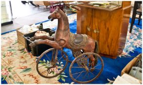 Carved Wood Horse Tricycle With a Carved Wood Seat. Decorated and Mounted on an Iron Filigree Side