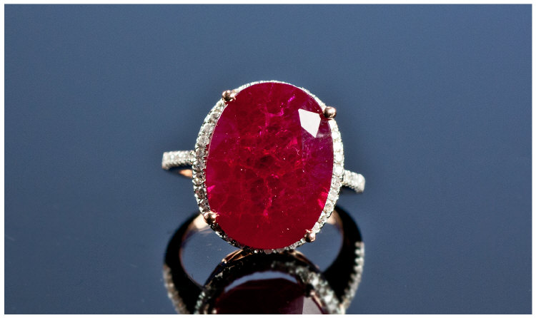 Oval Ruby Ring, Surrounded By Small Round Cut Diamonds, Diamond Set Shoulders, Estimated Ruby