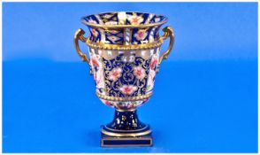 Royal Crown Derby Small Imari Pattern Two Handled Urn Shaped Vase. Date 1907. 3.75 inches high.