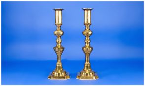 A Fine Pair Of 19th Century Diamond Cut Brass Candlesticks, of good quality. Each standing 12