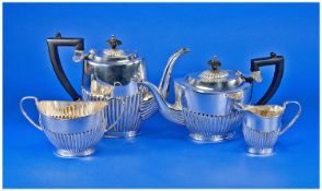 Sheffield Four Piece Silver Plated Tea Set, with ebony handles by Parkin. The body with half fluted