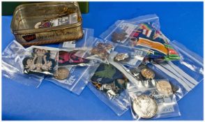 Small Collection of Metal and Fabric Military Badges, a bag of medal ribbons and a few other badges