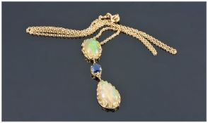 18ct Gold Opal Necklace, Oval Shaped White Opal (13 x 8mm) Suspended Above An Oval Sapphire And A